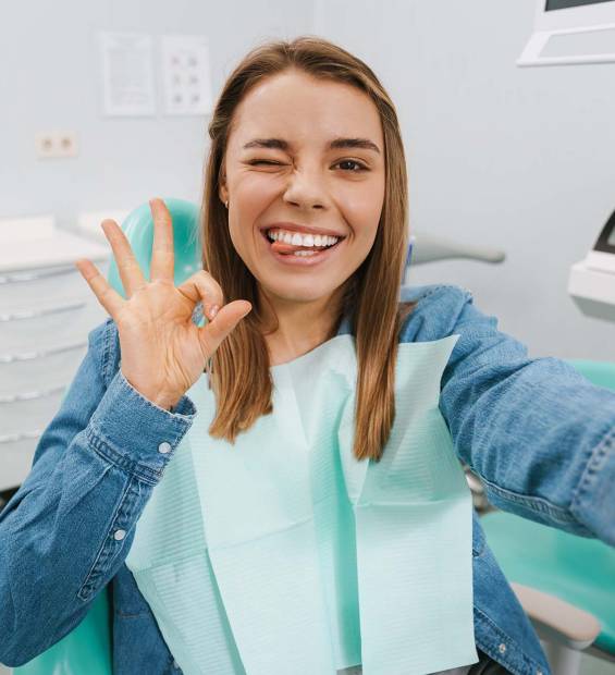 smiling woman teeth cdc